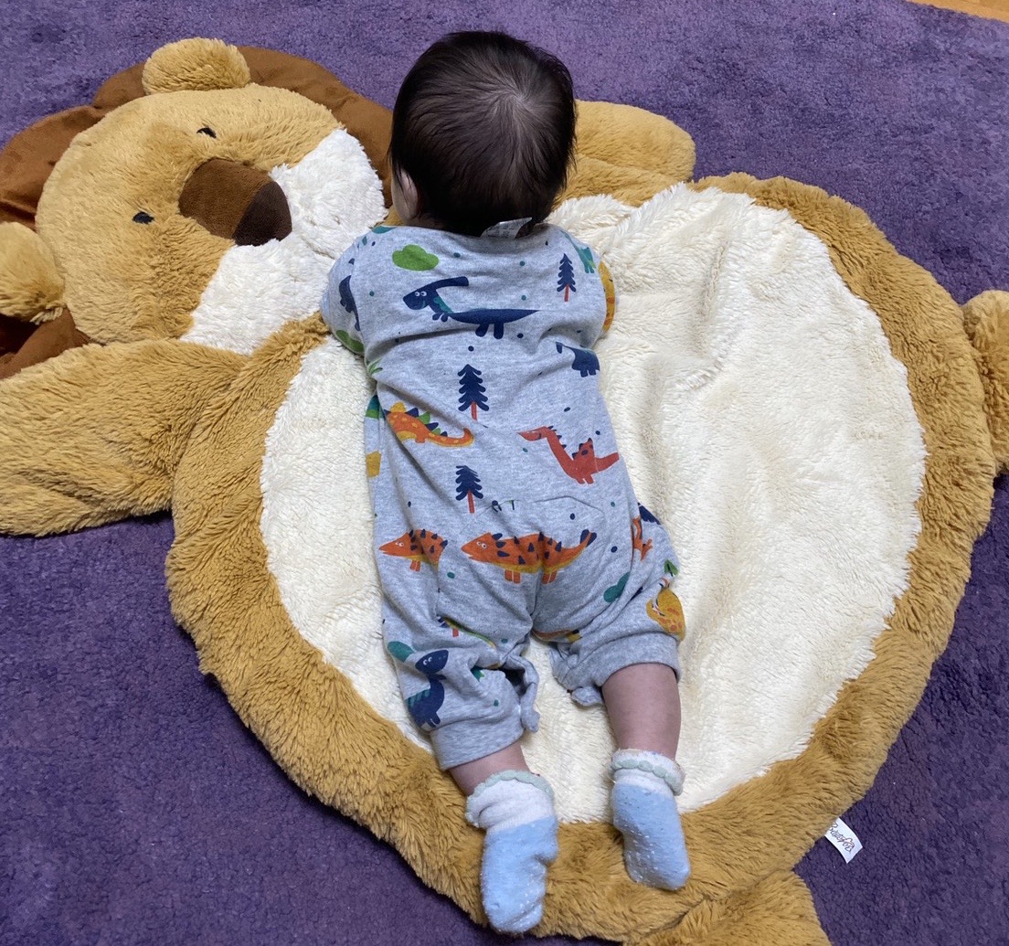 newborn on mat