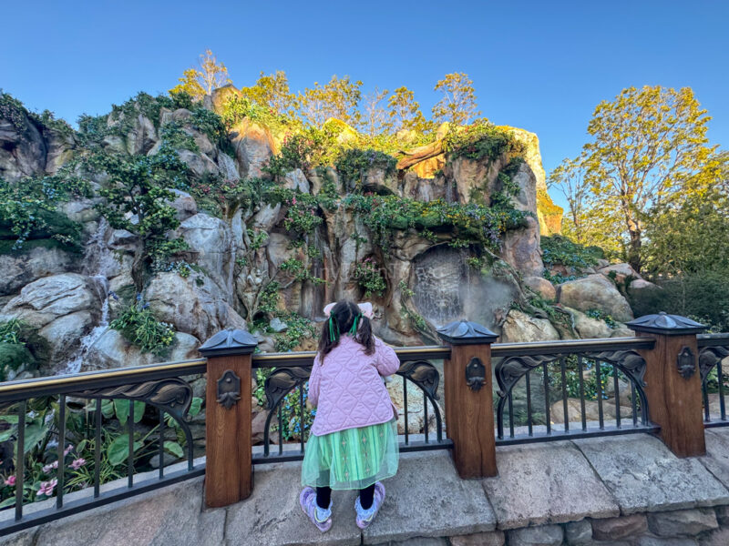 child looking at stone sculptures at Fantasy Springs Tokyo DisneySea