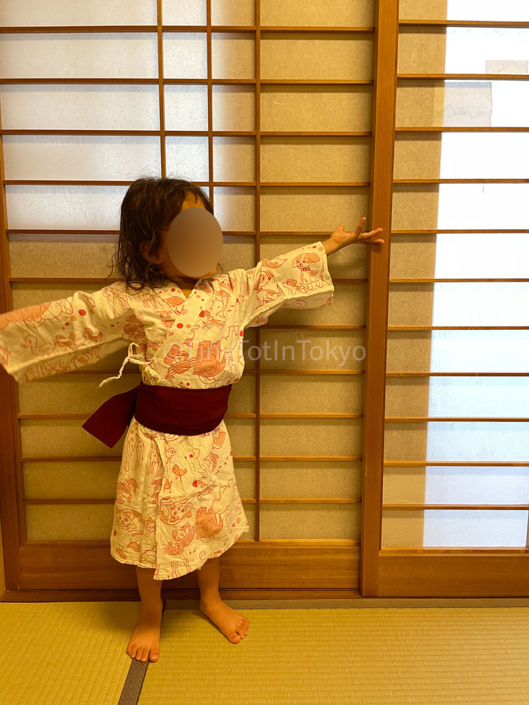 toddler wearing a yukata at a ryokan in nara japan