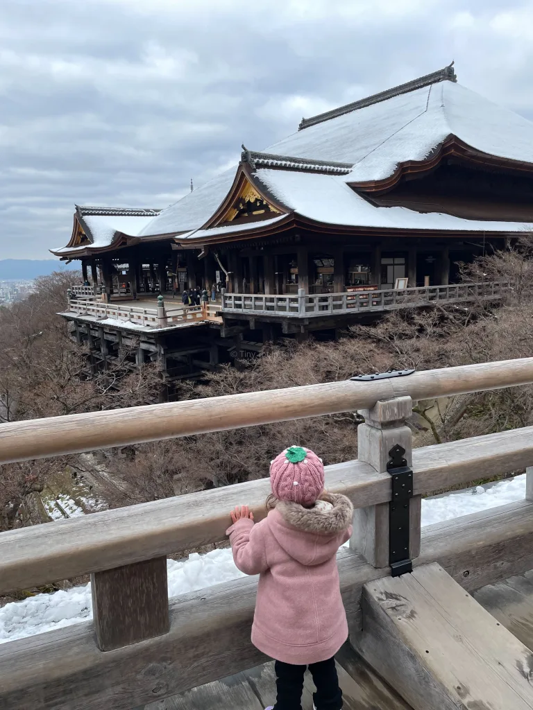 Kid looking out to Kiyomizudera Temple in Kyoto Japan