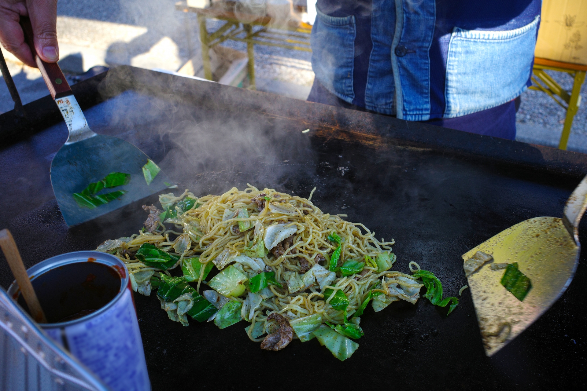 yakisoba being cooked at a summer festival in Japan
