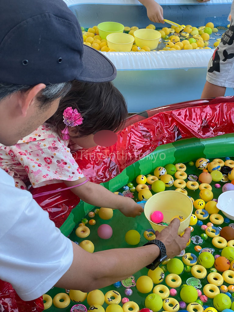 fishing game at summer festival in japan