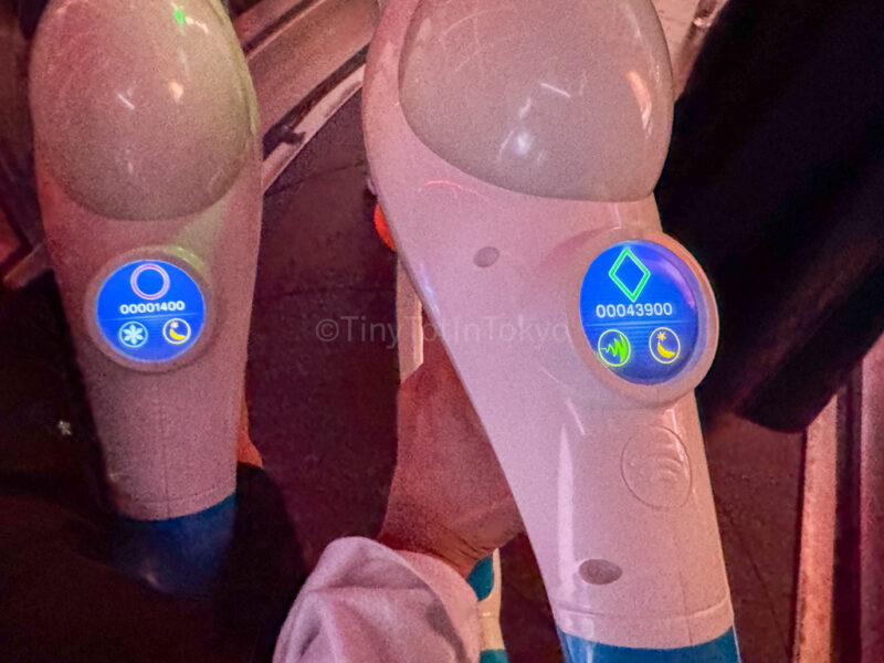 blasters from a child on the Illumination's Villain-Con Minion Blast ride at USJ