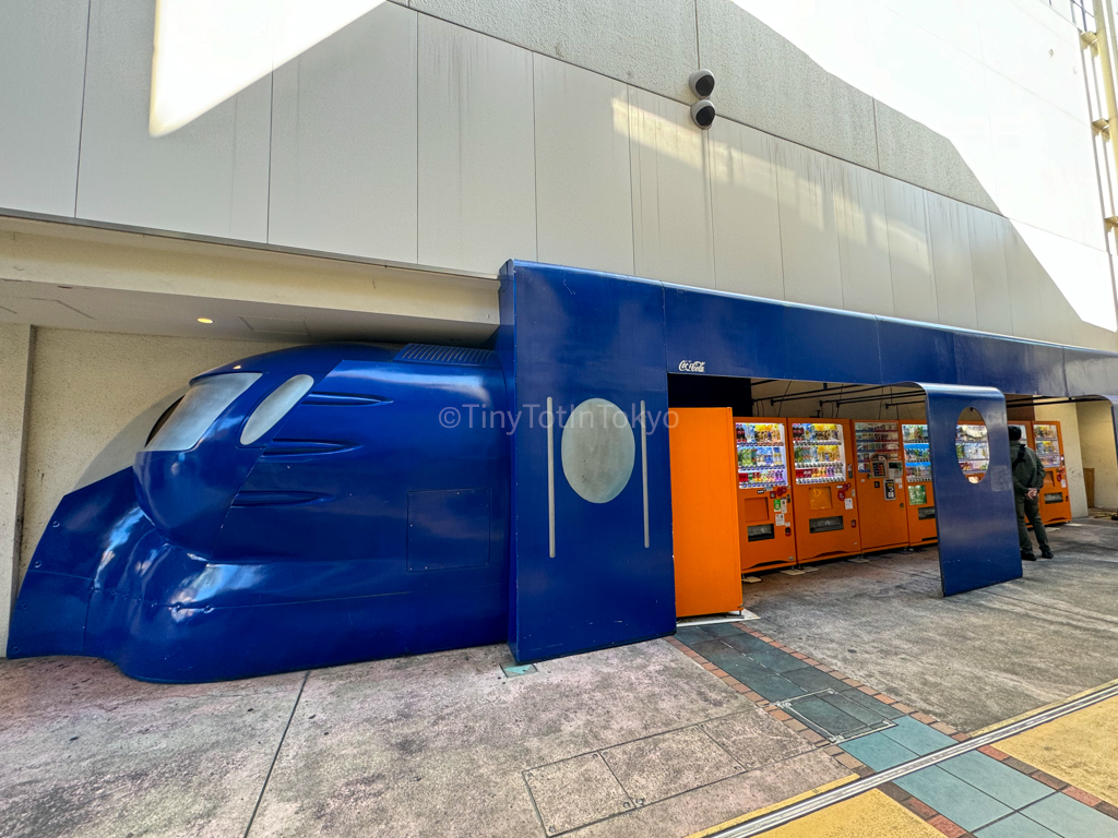 blue train in front of namba parks