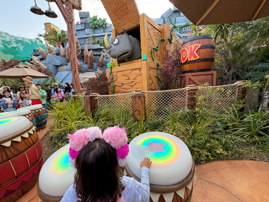 girl playing drums at donkey kong universal studios japan