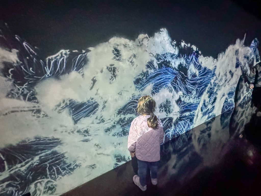 wave artwork at teamlab borderless with kids 