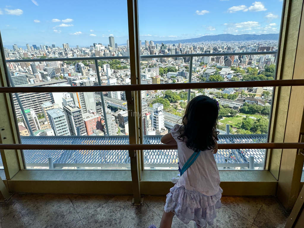 Child at observation deck at Tsutenkaku Tower in Osaka