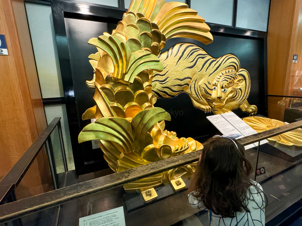 CHild looking at cultural relics at Osaka Castle 