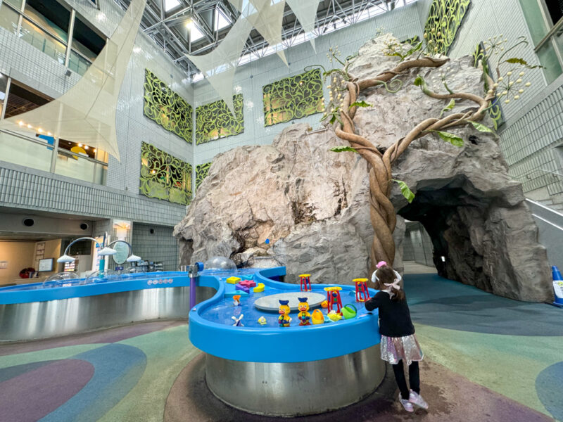 a child playing at tokyo water science museum