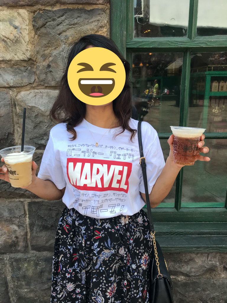 Author holding butter beer at Universal Studios Japan