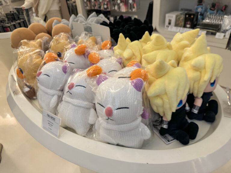 Final Fantasy ARTNIA souvenir shop featuring cloud and moogle stuffed toys