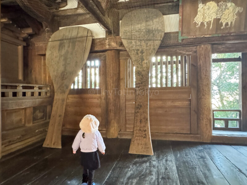 giant rice paddle in hokoku shrine in miyajima