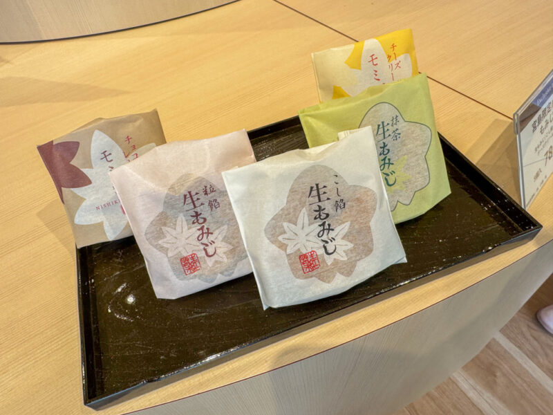 Five packages of different flavors of momiji manju