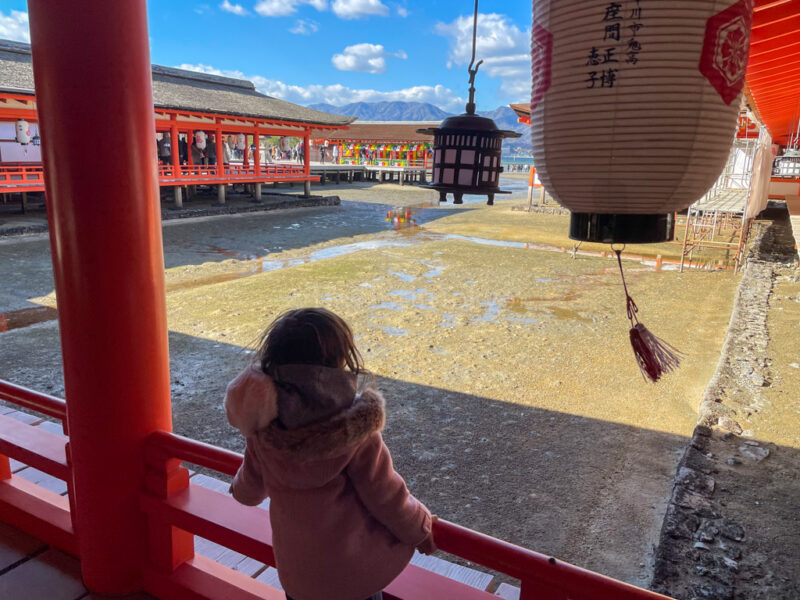 A child at Itsukushima Shrine in Miyajima