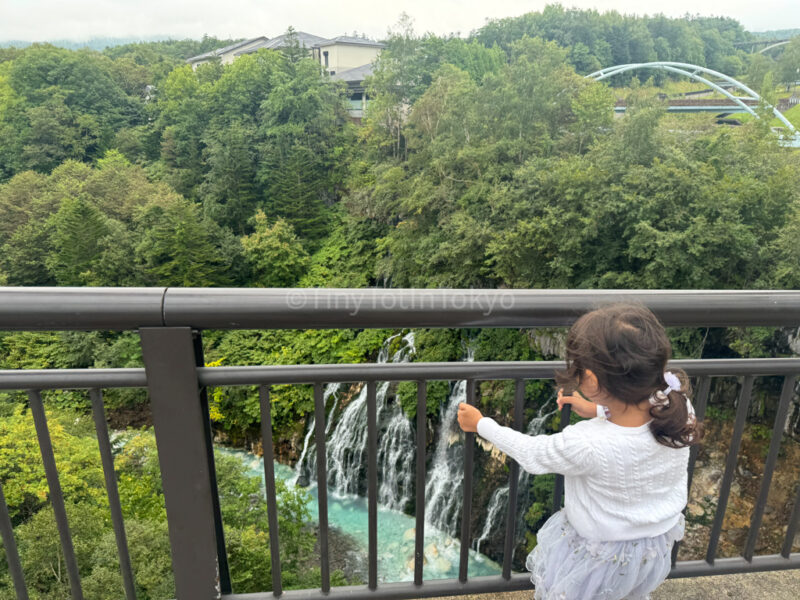 A child at the Shirahige Waterfal in Biei Hokkaido