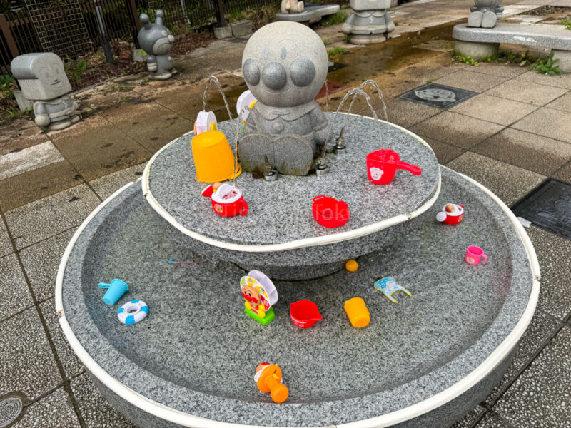 Anpanman stone fountain with toys in Furano
