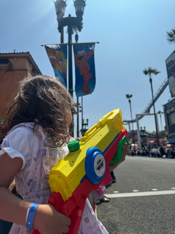 child at the summer splash parade at universal studios Japan