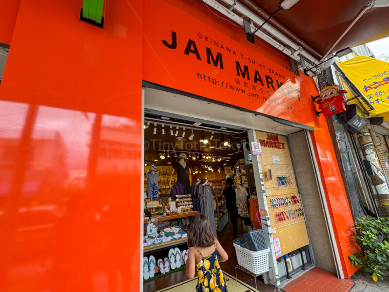 a child walking into JAM MARKET Souvenir shop in Okinawa