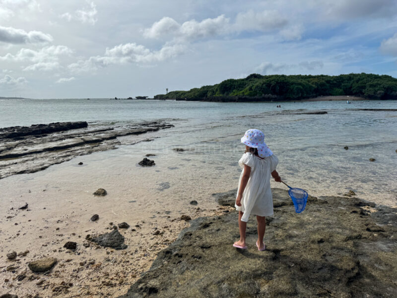 a child at Bisezaki beach in Okinawa