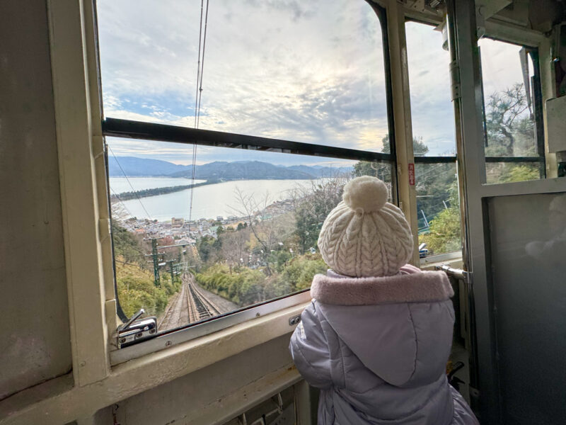 girl in the cable car from kasamatsu park in amanohashidate