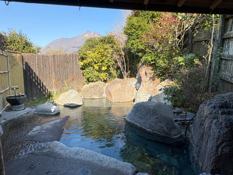 private open-air onsen at room at Yama no Hotel Musouen in Yufuin