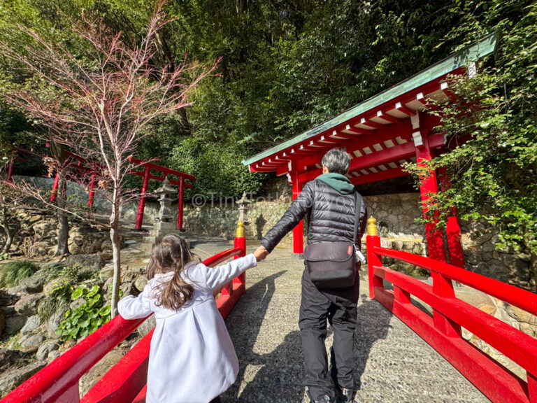 a child and their parent in winter in japan