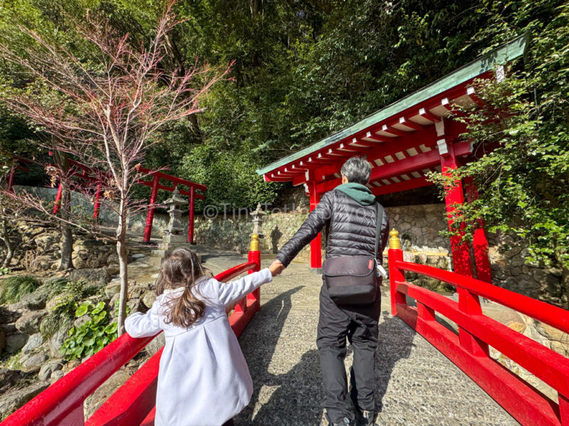 a child and their parent in winter in japan