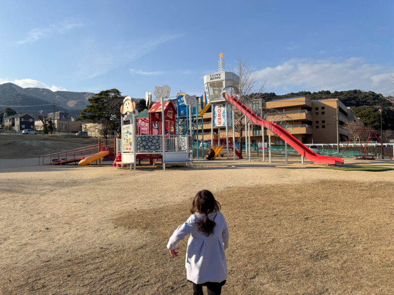 a child at playground in beppu near hells