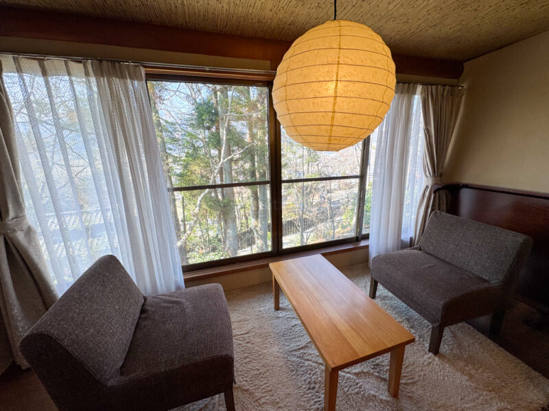chairs in room at Yama no Hotel Musouen in Yufuin