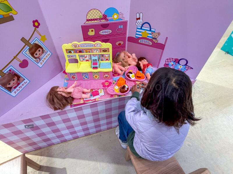 A child playing with toys in osaka