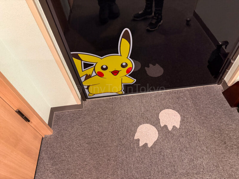 footprints on the floor at MIMARU pokemon hotel japan