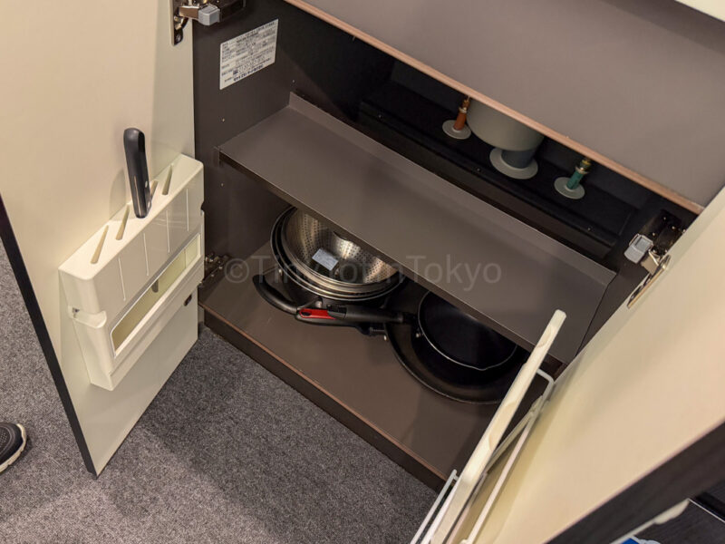 kitchen cupboard at MIMARU pokemon hotel room