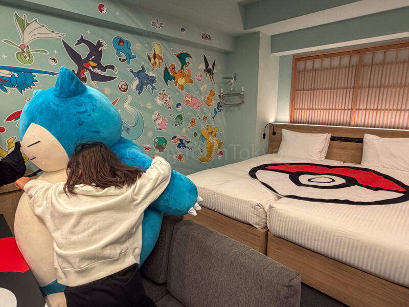 a child with snorlax at MIMARU pokemon hotel japan
