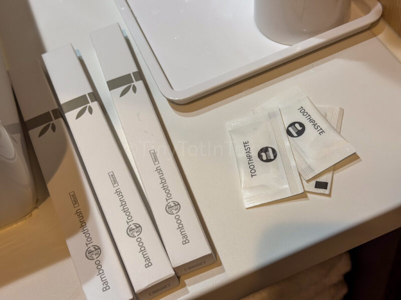 toothbrushes and toothpaste at Japan Pokemon hotel room