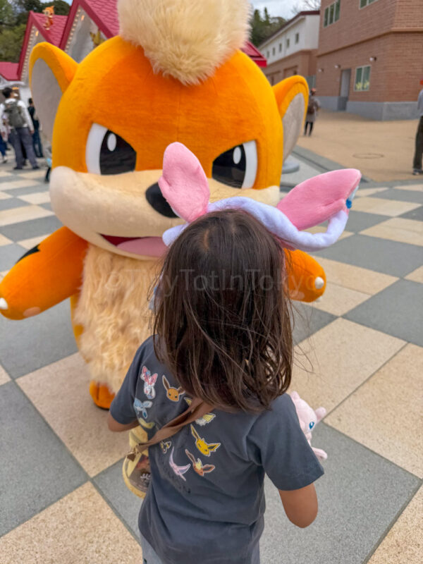 a child with growlith at pokepark kanto