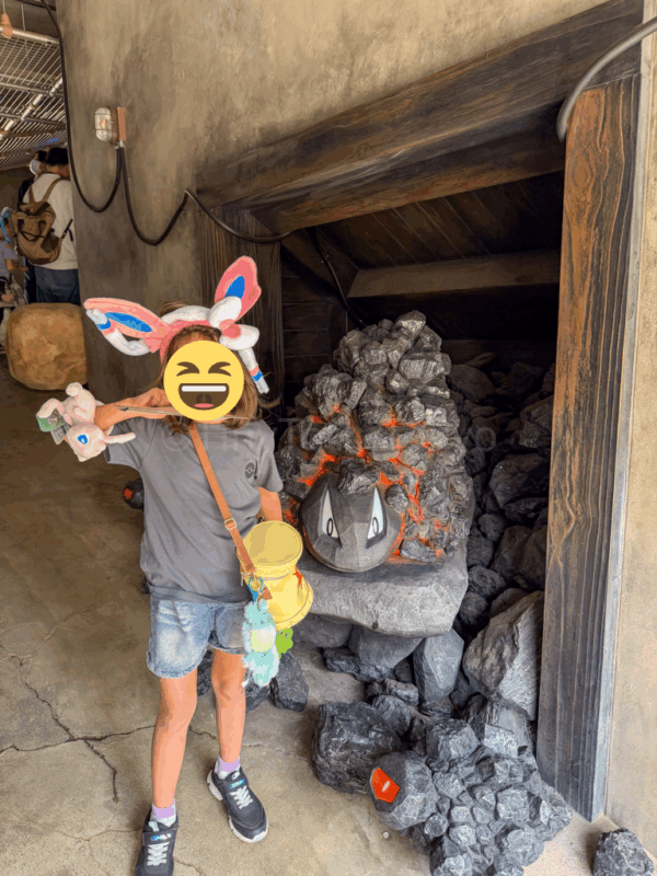 a child and pokemon in the pokemon forest at pokepark kanto