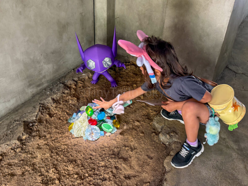 a child inside pokemon forest at pokepark kanto