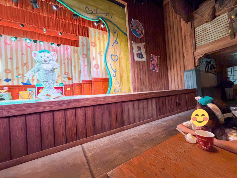 a child at Duffy and Friends show restaurant at tokyo disneysea