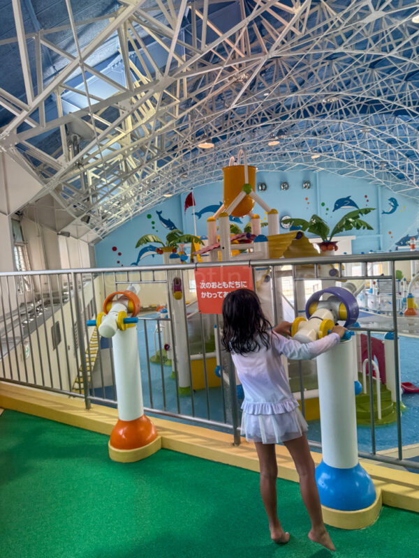 a child using a watergun at Nagashima Water Park Jumbo Saltwater Pool