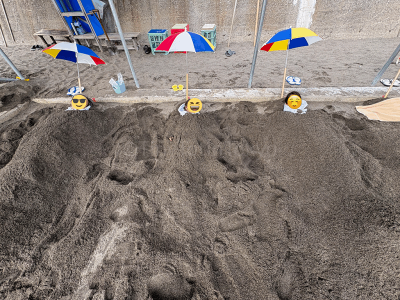a family enjoying ibusuki sand bath in kagoshima
