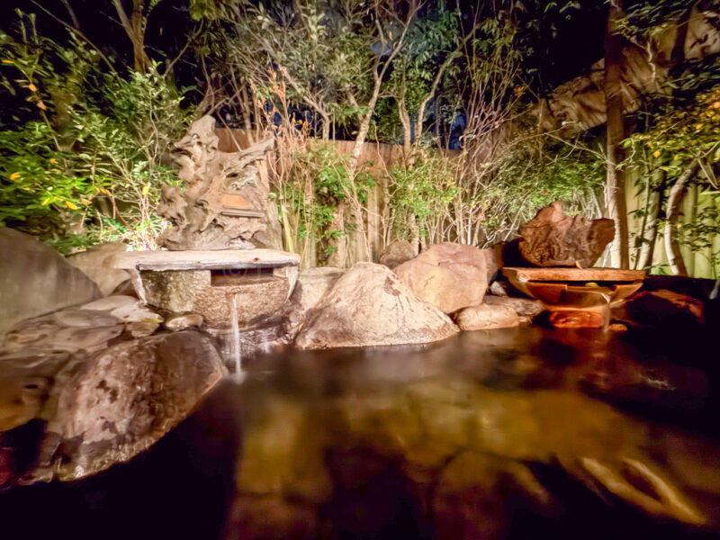open-air bath at night at Shikinoyado Meisui ryokan in Kagoshima