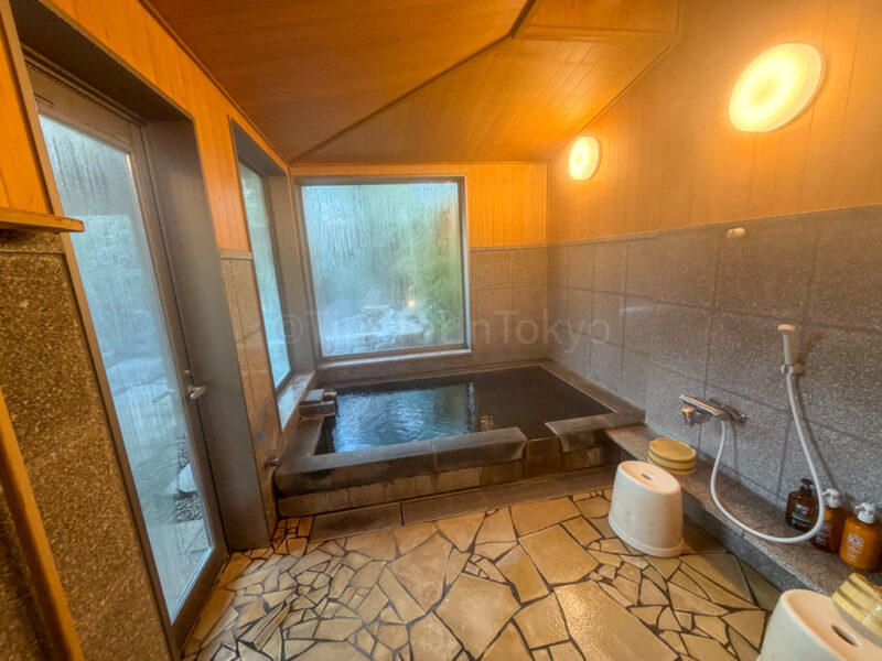 shower and onsen bath at Shikinoyado Meisui ryokan in Kagoshima