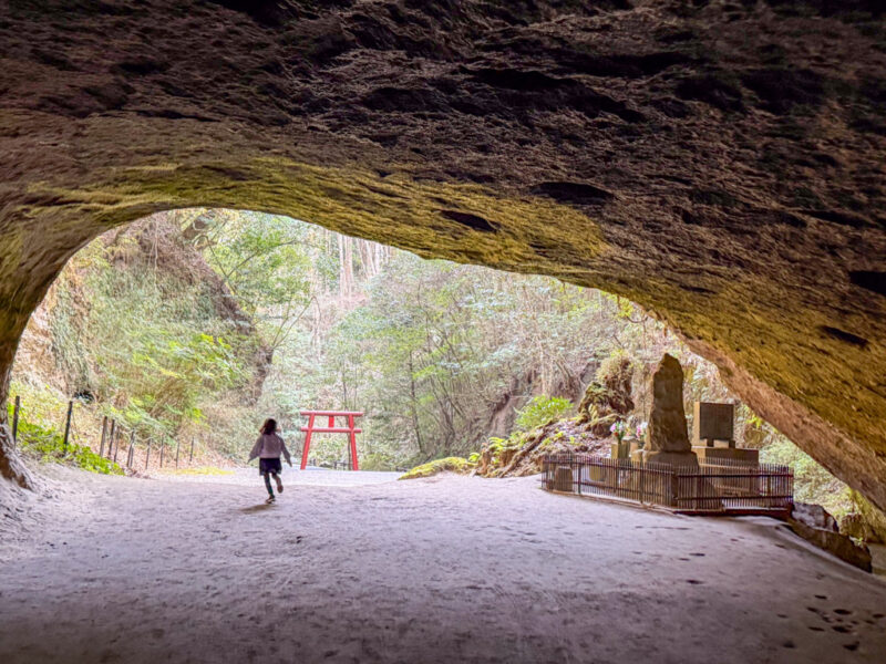 a child at Mizonokuchi Cave in Kagoshima
