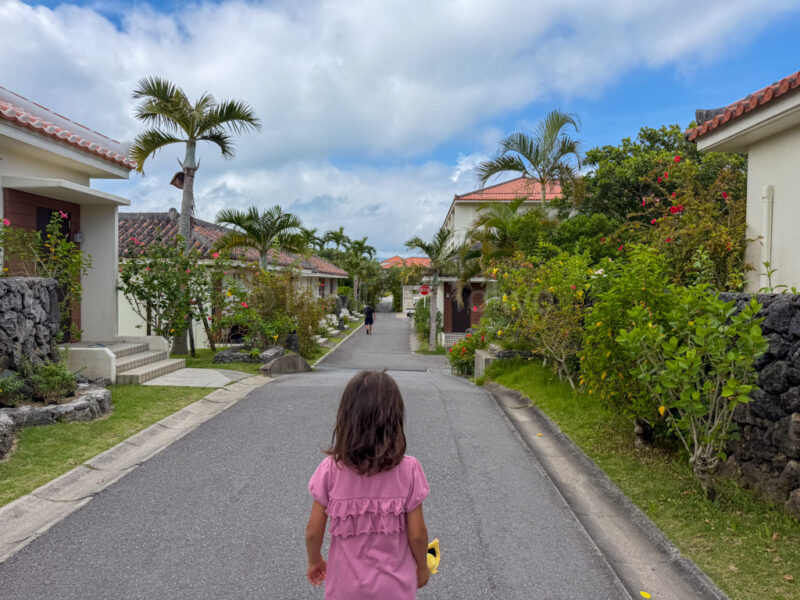 a child walking in fusaki beach resort ishigaki