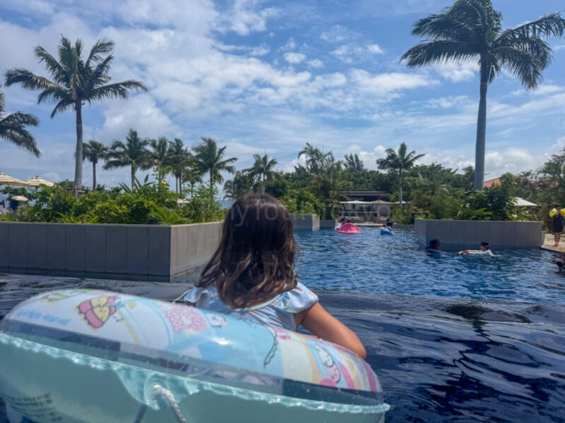 child in pool at fusaki beach resort ishigaki