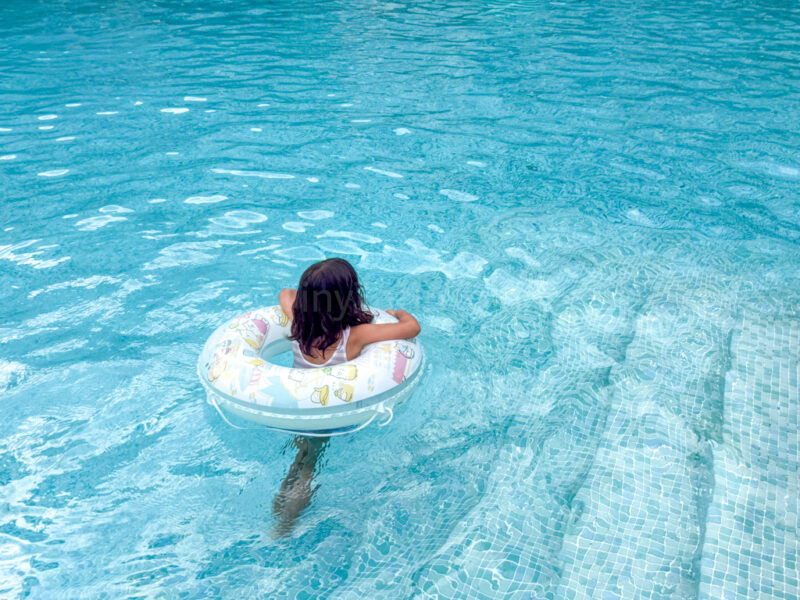 child swimming in pool at ANA InterContinental Ishigaki Resort
