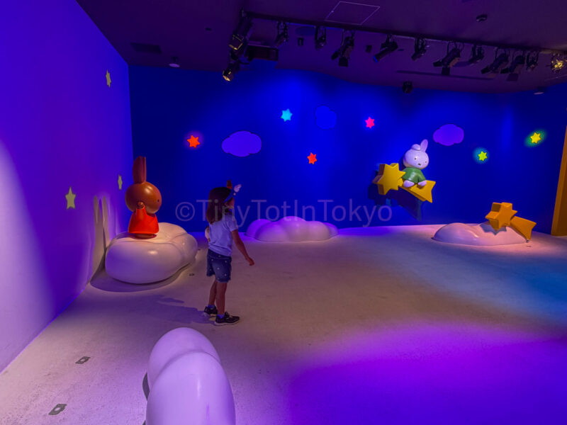 a child inside miffy's dream storybook at huis ten bosch