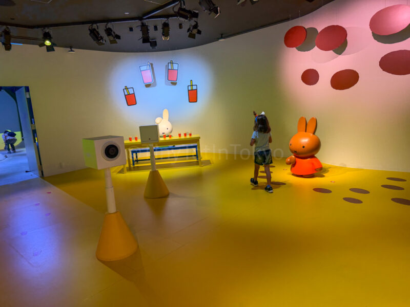 a child inside miffy's dream storybook at huis ten bosch