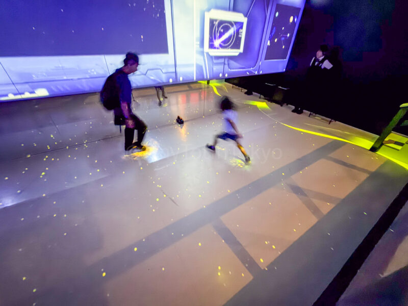 a parent and child in space fantasy at huis ten bosch