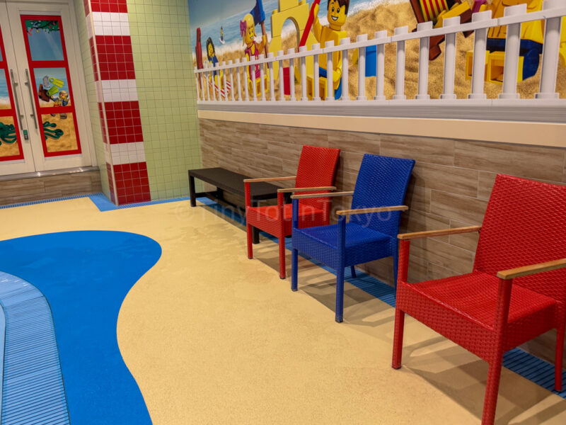 chairs in water play area at legoland japan hotel